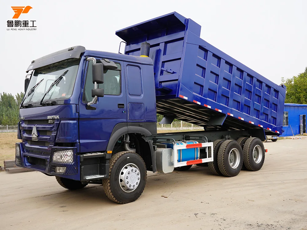 Blue HOWO 6x4 dump truck with hydraulic cargo body raised