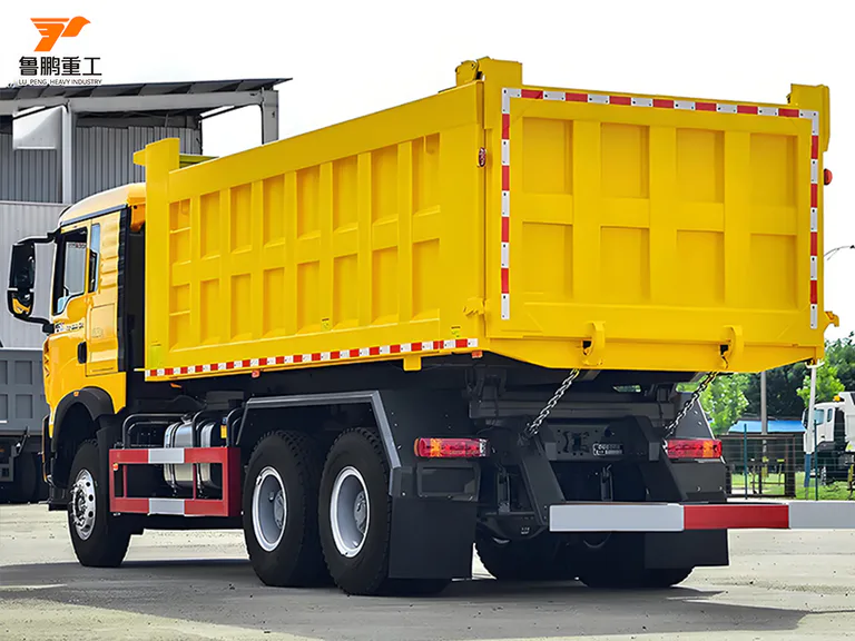 Side and rear view of a yellow HOWO 6x4 dump truck cargo body and tailgate