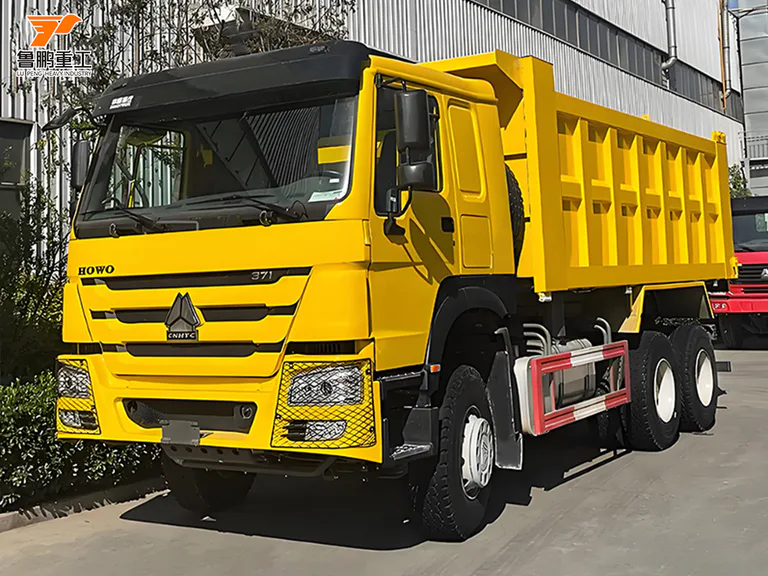 Yellow SINOTRUK HOWO 371 6x4 dump truck viewed from the front and side